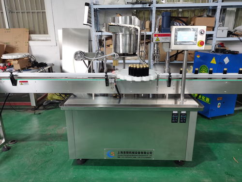 口服液灌裝軋蓋機工作原理